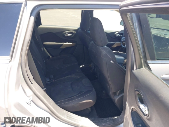 2017 Jeep Cherokee Latitude with VIN 1C4PJMCB1HD213964, listed as a IAAI auction lot 42263437 with 105,618 mi miles and . Bid and sale history available at DreamBid. Image 8.