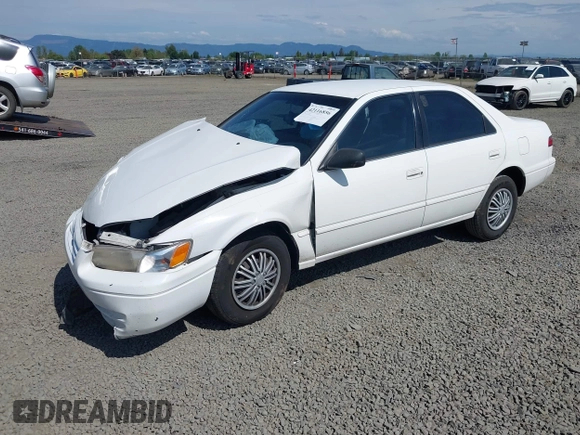 1999 Toyota Camry LE z VIN 4T1BG22K0XU862535, wystawiony jako IAAI lot #42116856 z przebiegiem 186 094 mil mil oraz . Historia ofert i sprzedaży dostępna na DreamBid. Obrazek 2.