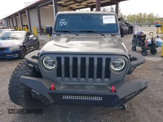 2021 Jeep Wrangler Unlimited Rubicon with VIN 1C4HJXFG9MW531858, listed as a IAAI auction lot 42001095 with 38,240 mi miles and . Bid and sale history available at DreamBid. Image 12.