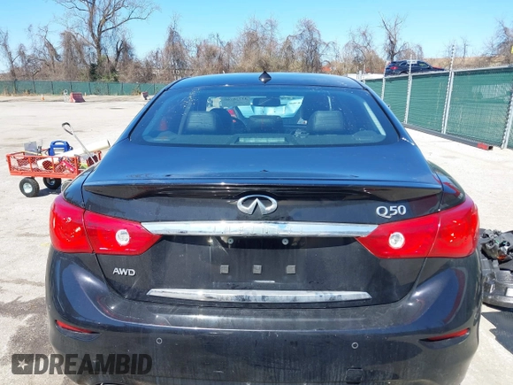 2015 Infiniti Q50 Premium z VIN JN1BV7AR2FM416586, wystawiony jako IAAI lot #41728760 z przebiegiem 138 446 mil mil oraz . Historia ofert i sprzedaży dostępna na DreamBid. Obrazek 17.