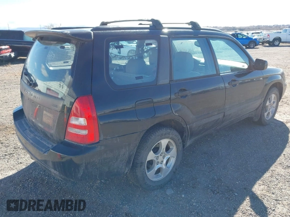 2003 Subaru Forester XS with VIN JF1SG65673G743292, listed as a IAAI auction lot 41587235 with 251,523 mi miles. Bid and sale history available at carsss.com. Image 4.