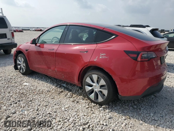 2021 Tesla Model Y Standard Range with VIN 5YJYGDED5MF116562, listed as a Copart auction lot 51211535 with 68,549 mi miles and Salvage Title. Bid and sale history available at DreamBid. Image 2.