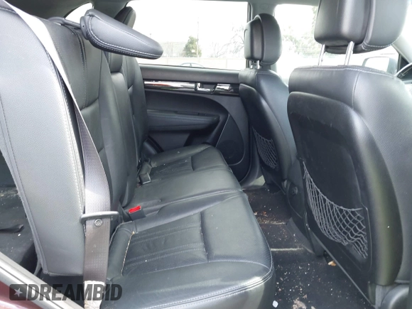 2012 Kia Sorento SX z VIN 5XYKWDA25CG283654, wystawiony jako IAAI lot #41803333 z przebiegiem 271 807 mil mil oraz . Historia ofert i sprzedaży dostępna na DreamBid. Obrazek 8.