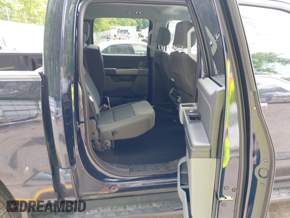 2023 Ford F-150 Lightning Pro with VIN 1FTVW1EL6PWG30061, listed as a IAAI auction lot 42362295 with 22,481 mi miles and . Bid and sale history available at DreamBid. Image 8.