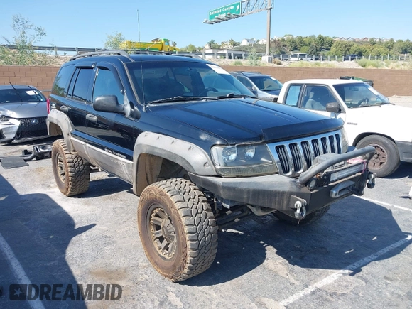 2000 Jeep Grand Cherokee Laredo with VIN 1J4GW48N0YC204645, listed as a IAAI auction lot 42650659 with 217,851 mi miles and . Bid and sale history available at DreamBid. Image 1.