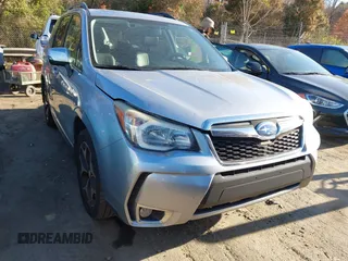 2015 Subaru Forester 2.0XT Touring with VIN JF2SJGWC7FH511989, listed as a IAAI auction lot 41888571 with 135,501 mi miles. Bid and sale history available at carsss.com. Image 6.