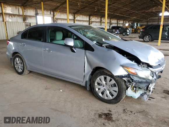 2012 Honda Civic LX z VIN 2HGFB2F59CH580899, wystawiony jako Copart lot #59803775 z przebiegiem 96 323 mil mil oraz Szkoda całkowita • Salvage title. Historia ofert i sprzedaży dostępna na DreamBid. Obrazek 4.