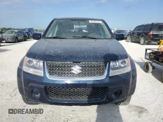 2012 Suzuki Grand Vitara Premium z VIN JS3TD0D29C4100139, wystawiony jako Copart lot #49163115 z przebiegiem 271 080 mil mil oraz Nie do naprawy. Historia ofert i sprzedaży dostępna na DreamBid. Obrazek 5.
