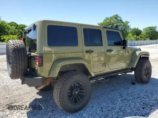 2013 Jeep Wrangler Unlimited Rubicon with VIN 1C4BJWFG0DL587057, listed as a Copart auction lot 57362535 with 102,684 mi miles and Salvage title. Bid and sale history available at DreamBid. Image 3.