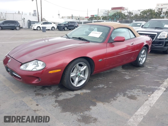1997 Jaguar XK with VIN SAJGX2745VC017589, listed as a IAAI auction lot 42208129 with Not Provided miles and . Bid and sale history available at DreamBid. Image 2.