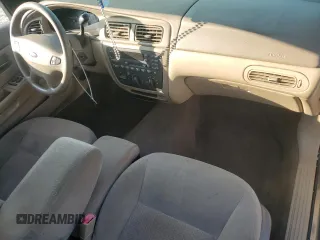 2003 Ford Taurus z VIN 1FAFP52253A170456, wystawiony jako Copart lot #70009824 z przebiegiem 216 567 mil mil oraz Szkoda całkowita • Salvage title. Historia ofert i sprzedaży dostępna na DreamBid. Obrazek 8.