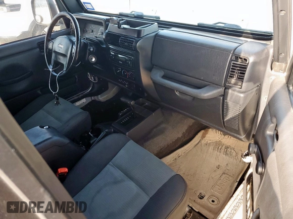 2005 Jeep Wrangler X с VIN 1J4FA39S45P353119, выставлен на аукционе Copart как лот 64206825 с пробегом 134 298 миль миль и Списание • Salvage title. История ставок и продаж доступна на DreamBid. Изображение 8.