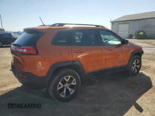 2015 Jeep Cherokee Trailhawk with VIN 1C4PJMBS0FW604168, listed as a Copart auction lot 51470625 with 186,211 mi miles and Salvage Title. Bid and sale history available at carsss.com. Image 3.