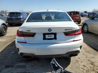 2022 BMW 3 Series M340i xDrive with VIN WBA5U9C02NFM31354, listed as a Copart auction lot 50986335 with Not Provided miles and Clean Title. Bid and sale history available at DreamBid. Image 6.