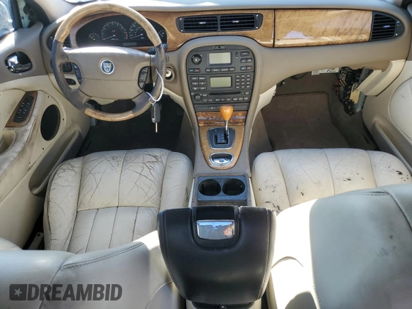 2003 Jaguar S-Type with VIN SAJEA01T93FM46260, listed as a Copart auction lot 87573835 with 129,563 mi miles and Clean Title. Bid and sale history available at DreamBid. Image 8.