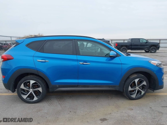 2016 Hyundai Tucson Eco with VIN KM8J3CA28GU041357, listed as a IAAI auction lot 41661997 with 87,000 mi miles. Bid and sale history available at carsss.com. Image 13.