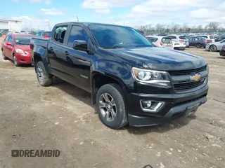 2017 Chevrolet Colorado 4WD Z71 z VIN 1GCGTDEN7H1158021, wystawiony jako IAAI lot #42021861 z przebiegiem 58 559 mil mil oraz . Historia ofert i sprzedaży dostępna na DreamBid. Obrazek 1.