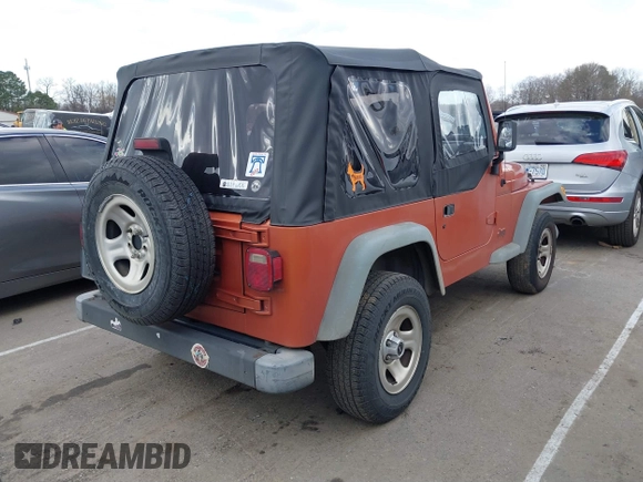 2000 Jeep Wrangler SE with VIN 1J4FA29P2YP804574, listed as a IAAI auction lot 41723297 with 172,991 mi miles. Bid and sale history available at carsss.com. Image 4.
