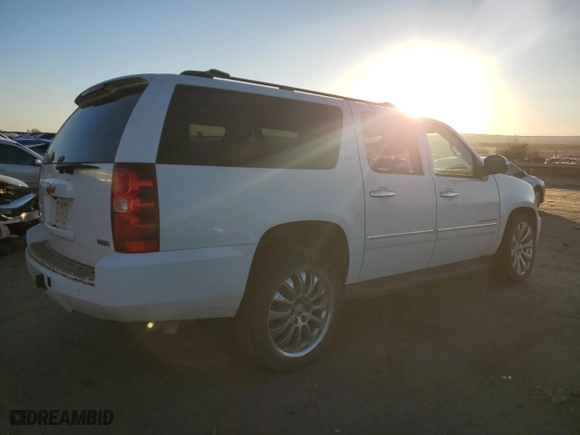 2012 Chevrolet Suburban LTZ with VIN 1GNSKKE73CR302488, listed as a Copart auction lot 80087504 with 169,583 mi miles and Salvage Title. Bid and sale history available at carsss.com. Image 3.