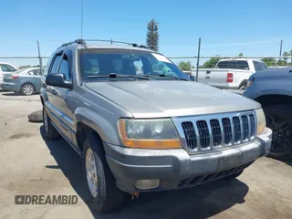 1999 Jeep Grand Cherokee Laredo z VIN 1J4G258S3XC683326, wystawiony jako IAAI lot #42547102 z przebiegiem 320 250 mil mil oraz . Historia ofert i sprzedaży dostępna na DreamBid. Obrazek 1.