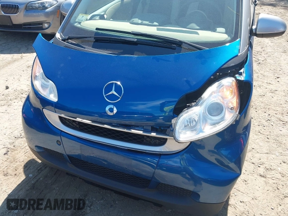 2009 Smart fortwo Pure with VIN WMEEJ31X79K210162, listed as a IAAI auction lot 42715203 with 95,089 mi miles and . Bid and sale history available at DreamBid. Image 6.