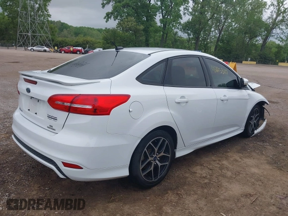 2016 Ford Focus SE with VIN 1FADP3F21GL288553, listed as a IAAI auction lot 42253117 with 107,727 mi miles and . Bid and sale history available at DreamBid. Image 4.