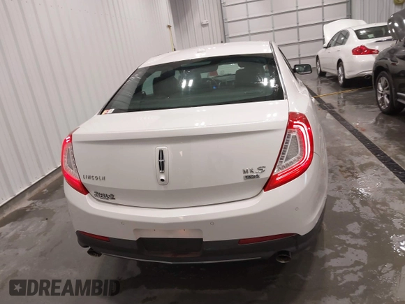 2014 Lincoln MKS with VIN 1LNHL9EK5EG605750, listed as a IAAI auction lot 41565308 with 167,835 mi miles. Bid and sale history available at carsss.com. Image 16.