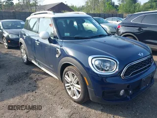 2018 MINI Countryman Cooper S z VIN WMZYT5C3XJ3E60444, wystawiony jako IAAI lot #42422793 z przebiegiem 96 722 mil mil oraz . Historia ofert i sprzedaży dostępna na DreamBid. Obrazek 13.