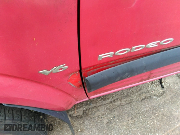 1998 Isuzu Rodeo S z VIN 4S2CK58WXW4325645, wystawiony jako IAAI lot #42013228 z przebiegiem 300 698 mil mil oraz . Historia ofert i sprzedaży dostępna na DreamBid. Obrazek 6.
