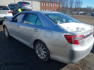 2014 Toyota Camry SE with VIN 4T1BK1FK6EU548176, listed as a IAAI auction lot 41392975 with 143,249 mi miles. Bid and sale history available at carsss.com. Image 3.
