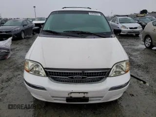 2000 Ford Windstar SE z VIN 2FMZA524XYBB18712, wystawiony jako Copart lot #84939844 z przebiegiem 68 479 mil mil oraz Czysty tytuł • Clean title. Historia ofert i sprzedaży dostępna na DreamBid. Obrazek 5.