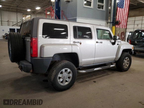 2007 Hummer H3 SUV with VIN 5GTDN13E778137599, listed as a Copart auction lot 76863904 with 210,810 mi miles and Salvage Title. Bid and sale history available at DreamBid. Image 3.