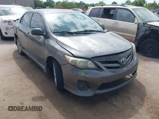 2012 Toyota Corolla L with VIN 5YFBU4EE3CP063628, listed as a IAAI auction lot 42025014 with 242,386 mi miles. Bid and sale history available at carsss.com. Image 1.