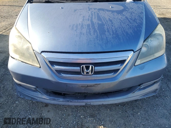 2005 Honda Odyssey EX-L with VIN 5FNRL38645B092814, listed as a Copart auction lot 50587065 with 262,912 mi miles and Salvage Title. Bid and sale history available at carsss.com. Image 12.