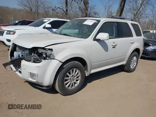 2010 Mercury Mariner Premier with VIN 4M2CN8HG5AKJ07771, listed as a IAAI auction lot 41779514 with 187,786 mi miles and . Bid and sale history available at DreamBid. Image 2.