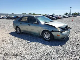 2005 Ford Focus S with VIN 1FAFP34NX5W200603, listed as a Copart auction lot 50146915 with 281,451 mi miles and Salvage Title. Bid and sale history available at DreamBid. Image 4.