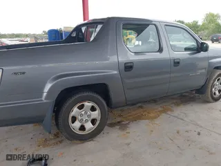 2009 Honda Ridgeline RT with VIN 2HJYK16279H501015, listed as a IAAI auction lot 41996301 with 124,716 mi miles. Bid and sale history available at carsss.com. Image 6.