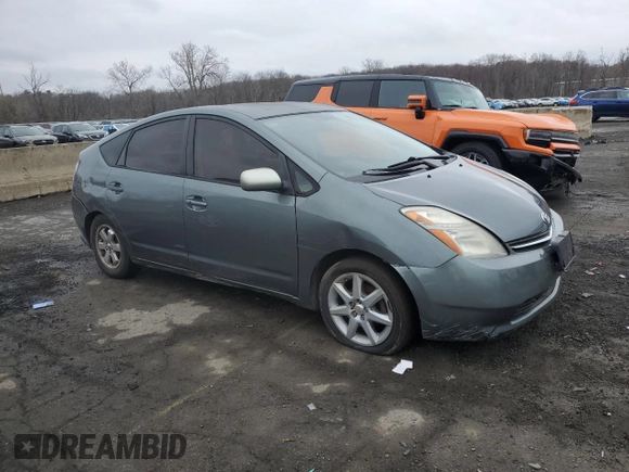 2004 Toyota Prius z VIN JTDKB20U640016341, wystawiony jako Copart lot #52828115 z przebiegiem 53 551 mil mil oraz Czysty tytuł • Clean title. Historia ofert i sprzedaży dostępna na DreamBid. Obrazek 4.