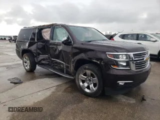 2020 Chevrolet Suburban Premier with VIN 1GNSCJKC7LR210387, listed as a Copart auction lot 64700645 with Not provided miles and Salvage title. Bid and sale history available at DreamBid. Image 4.
