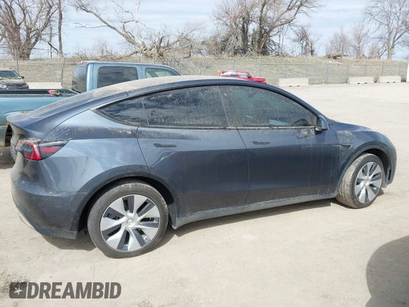 2022 Tesla Model Y Long Range with VIN 7SAYGDEE5NF534259, listed as a IAAI auction lot 41860246 with 24,513 mi miles and . Bid and sale history available at carsss.com. Image 13.