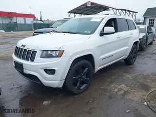2015 Jeep Grand Cherokee Altitude with VIN 1C4RJFAG7FC954853, listed as a IAAI auction lot 40988796 with 107,002 mi miles. Bid and sale history available at carsss.com. Image 17.