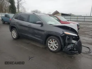 2015 Jeep Cherokee Latitude with VIN 1C4PJLCB9FW560566, listed as a Copart auction lot 51741275 with Not Provided miles and Salvage Title. Bid and sale history available at DreamBid. Image 4.
