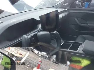 2021 Tesla Model S Long Range with VIN 5YJSA1E51MF440929, listed as a IAAI auction lot 41144902 with Not provided miles and . Bid and sale history available at DreamBid. Image 7.