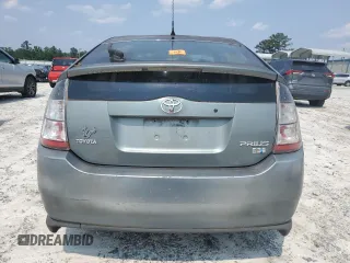 2004 Toyota Prius z VIN JTDKB20U840009617, wystawiony jako Copart lot #59214475 z przebiegiem Nie podano mil oraz Czysty tytuł • Clean title. Historia ofert i sprzedaży dostępna na DreamBid. Obrazek 6.