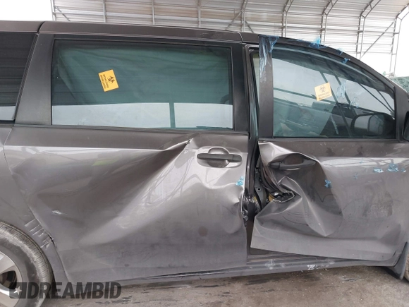 2014 Toyota Sienna L with VIN 5TDZK3DC5ES475204, listed as a IAAI auction lot 41277584 with 125,735 mi miles. Bid and sale history available at carsss.com. Image 12.