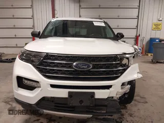 2022 Ford Explorer XLT z VIN 1FMSK8DH4NGB05636, wystawiony jako IAAI lot #42211545 z przebiegiem 55 366 mil mil oraz . Historia ofert i sprzedaży dostępna na DreamBid. Obrazek 13.