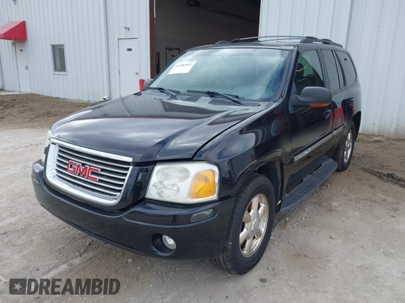 2002 GMC Envoy SLT with VIN 1GKDT13S622506181, listed as a IAAI auction lot 41986061 with 212,583 mi miles. Bid and sale history available at carsss.com. Image 2.
