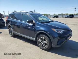 2017 Toyota RAV4 LE with VIN JTMBFREVXHJ700923, listed as a Copart auction lot 52887645 with 119,528 mi miles and Salvage title. Bid and sale history available at DreamBid. Image 4.