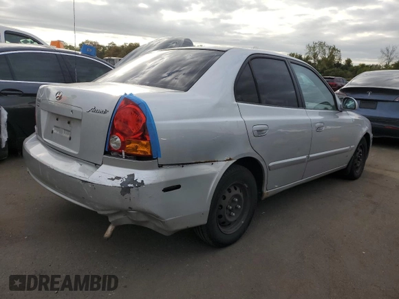 2005 Hyundai Accent GLS with VIN KMHCG45C45U631414, listed as a Copart auction lot 73963814 with 106,617 mi miles and Salvage Title. Bid and sale history available at carsss.com. Image 3.