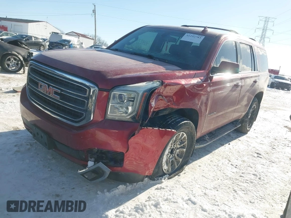 2015 GMC Yukon SLE with VIN 1GKS2AKC2FR514005, listed as a IAAI auction lot 41292783 with 129,413 mi miles. Bid and sale history available at carsss.com. Image 17.